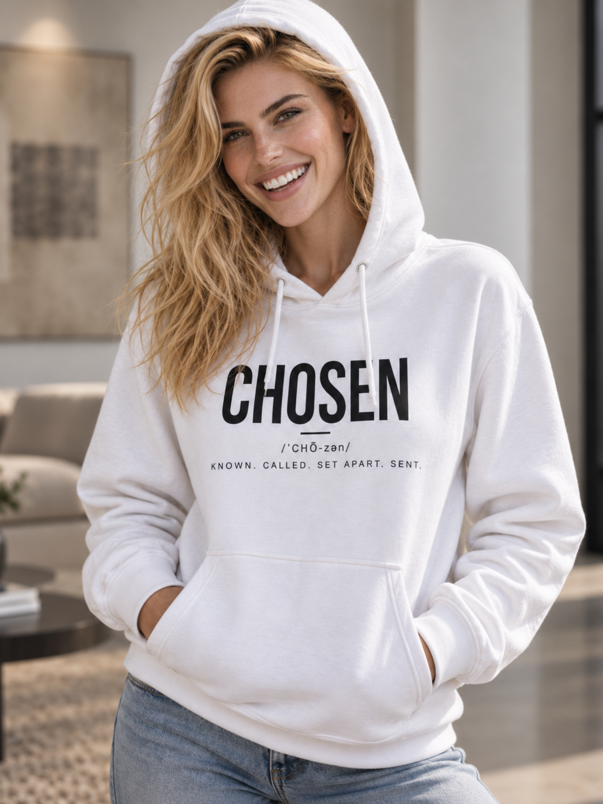Woman wearing white CHOSEN Christian hoodie with Known Called Set Apart Sent design