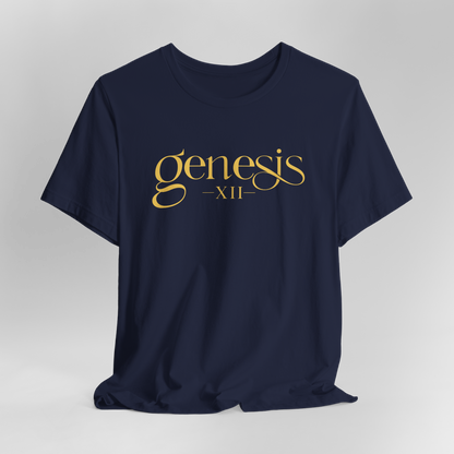 A navy blue short-sleeve t-shirt with 'genesis XII' printed in a gold serif font across the chest, displayed on a neutral gray gradient background.