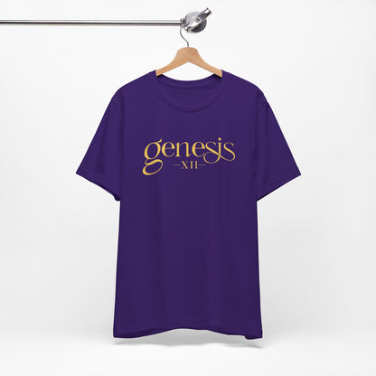 A purple short-sleeve t-shirt hanging on a wooden hanger from a metal clothing rack, featuring the text 'genesis XII' printed in gold across the chest.